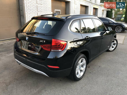 Чорний БМВ Х1, об'ємом двигуна 2 л та пробігом 175 тис. км за 10490 $, фото 1 на Automoto.ua