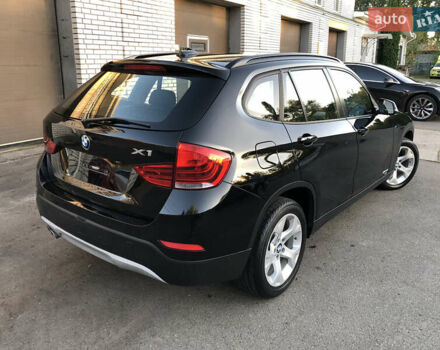 Чорний БМВ Х1, об'ємом двигуна 2 л та пробігом 175 тис. км за 10490 $, фото 1 на Automoto.ua