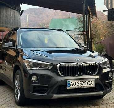 Черный БМВ Х1, объемом двигателя 2 л и пробегом 241 тыс. км за 19555 $, фото 1 на Automoto.ua