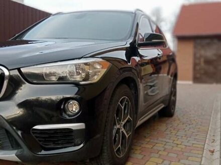 Чорний БМВ Х1, об'ємом двигуна 2 л та пробігом 125 тис. км за 13999 $, фото 1 на Automoto.ua