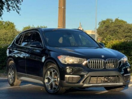 Черный БМВ Х1, объемом двигателя 2 л и пробегом 45 тыс. км за 12800 $, фото 1 на Automoto.ua