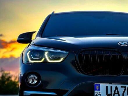 Чорний БМВ Х1, об'ємом двигуна 2 л та пробігом 148 тис. км за 19900 $, фото 1 на Automoto.ua