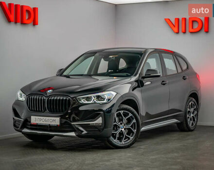 Чорний БМВ Х1, об'ємом двигуна 2 л та пробігом 60 тис. км за 28807 $, фото 1 на Automoto.ua
