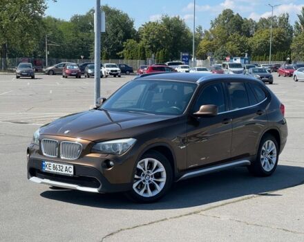 Коричневый БМВ Х1, объемом двигателя 2 л и пробегом 242 тыс. км за 11000 $, фото 1 на Automoto.ua