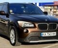 Коричневый БМВ Х1, объемом двигателя 3 л и пробегом 157 тыс. км за 9900 $, фото 1 на Automoto.ua