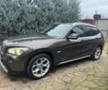 Коричневий БМВ Х1, об'ємом двигуна 2 л та пробігом 206 тис. км за 13700 $, фото 1 на Automoto.ua