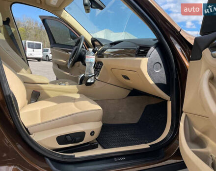 Коричневый БМВ Х1, объемом двигателя 2 л и пробегом 91 тыс. км за 14400 $, фото 26 на Automoto.ua