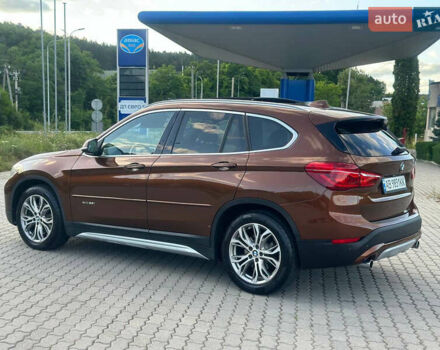 БМВ Х1 2015 в Могилев-Подольском на Automoto.ua Коричневый БМВ Х1, объемом двигателя 2 л и пробегом 270 тыс. км за 15500 $, фото 3 на Automoto.ua