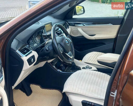 БМВ Х1 2015 в Могилев-Подольском на Automoto.ua Коричневый БМВ Х1, объемом двигателя 2 л и пробегом 270 тыс. км за 15500 $, фото 21 на Automoto.ua