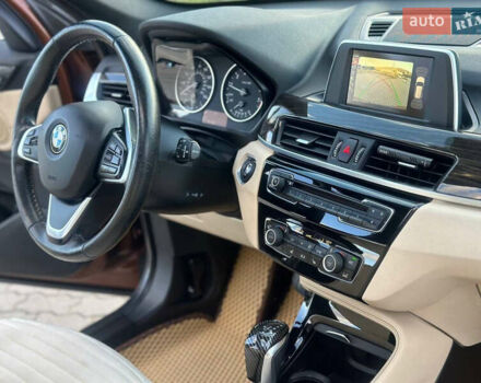 БМВ Х1 2015 в Могилев-Подольском на Automoto.ua Коричневый БМВ Х1, объемом двигателя 2 л и пробегом 270 тыс. км за 15500 $, фото 20 на Automoto.ua
