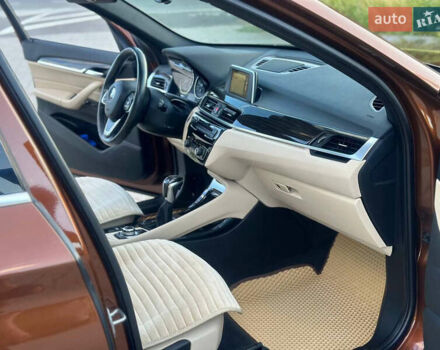 БМВ Х1 2015 в Могилев-Подольском на Automoto.ua Коричневый БМВ Х1, объемом двигателя 2 л и пробегом 270 тыс. км за 15500 $, фото 19 на Automoto.ua