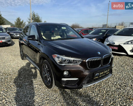 Коричневый БМВ Х1, объемом двигателя 2 л и пробегом 148 тыс. км за 17999 $, фото 2 на Automoto.ua