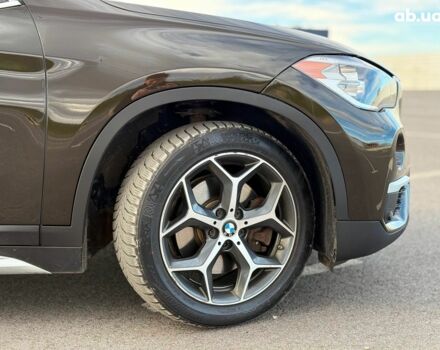 Коричневий БМВ Х1, об'ємом двигуна 2 л та пробігом 194 тис. км за 16990 $, фото 5 на Automoto.ua