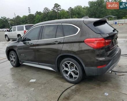 Коричневый БМВ Х1, объемом двигателя 2 л и пробегом 100 тыс. км за 3000 $, фото 1 на Automoto.ua