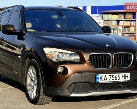Коричневый БМВ Х1, объемом двигателя 3 л и пробегом 157 тыс. км за 9900 $, фото 1 на Automoto.ua