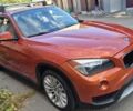 Красный БМВ Х1, объемом двигателя 2 л и пробегом 200 тыс. км за 12000 $, фото 1 на Automoto.ua
