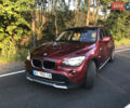 Червоний БМВ Х1, об'ємом двигуна 2 л та пробігом 176 тис. км за 14100 $, фото 1 на Automoto.ua