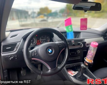 Красный БМВ Х1, объемом двигателя 2 л и пробегом 400 тыс. км за 12000 $, фото 6 на Automoto.ua