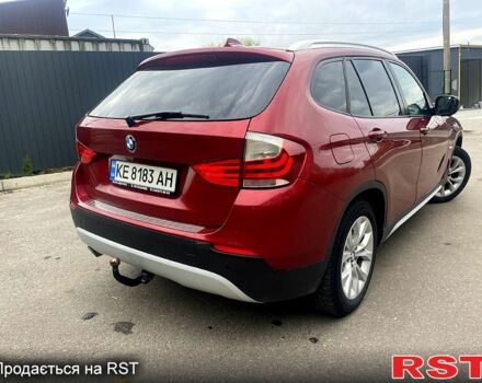 Красный БМВ Х1, объемом двигателя 2 л и пробегом 400 тыс. км за 12000 $, фото 4 на Automoto.ua