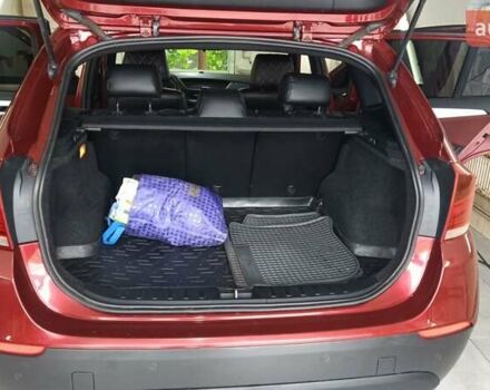 Червоний БМВ Х1, об'ємом двигуна 2 л та пробігом 238 тис. км за 10800 $, фото 6 на Automoto.ua