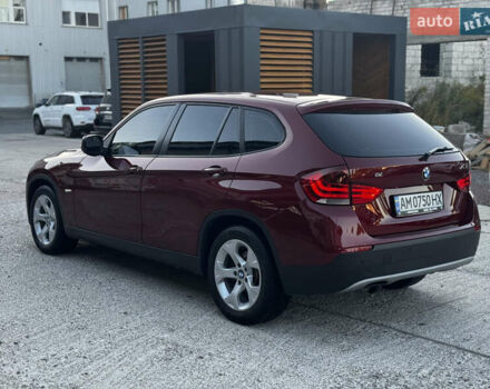 Красный БМВ Х1, объемом двигателя 2 л и пробегом 204 тыс. км за 12500 $, фото 1 на Automoto.ua