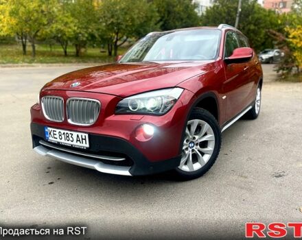 Красный БМВ Х1, объемом двигателя 2 л и пробегом 400 тыс. км за 12000 $, фото 1 на Automoto.ua