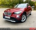 Красный БМВ Х1, объемом двигателя 2 л и пробегом 400 тыс. км за 12000 $, фото 1 на Automoto.ua