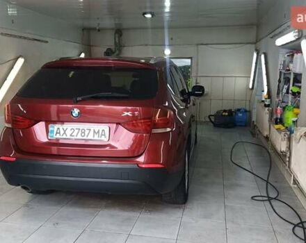 Червоний БМВ Х1, об'ємом двигуна 2 л та пробігом 238 тис. км за 10800 $, фото 2 на Automoto.ua