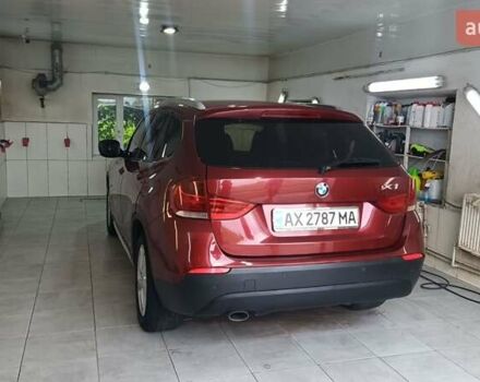 Червоний БМВ Х1, об'ємом двигуна 2 л та пробігом 238 тис. км за 10800 $, фото 5 на Automoto.ua