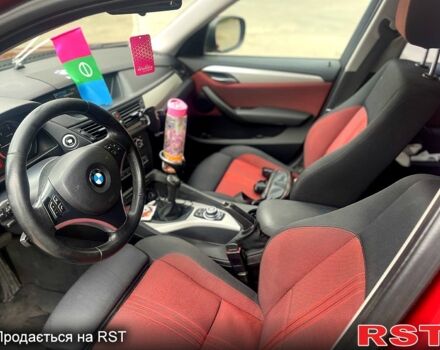 Красный БМВ Х1, объемом двигателя 2 л и пробегом 400 тыс. км за 12000 $, фото 7 на Automoto.ua