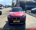 Красный БМВ Х1, объемом двигателя 2 л и пробегом 170 тыс. км за 12000 $, фото 1 на Automoto.ua