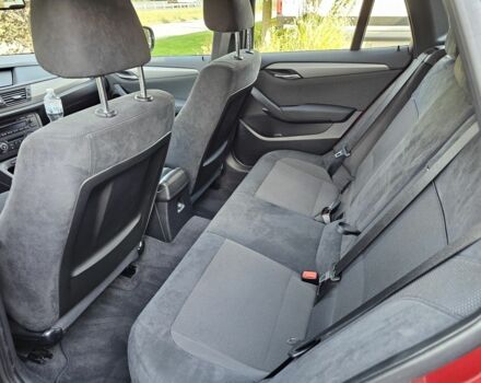 Красный БМВ Х1, объемом двигателя 2 л и пробегом 55 тыс. км за 18500 $, фото 4 на Automoto.ua