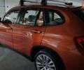 Красный БМВ Х1, объемом двигателя 2 л и пробегом 200 тыс. км за 12000 $, фото 1 на Automoto.ua