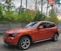 Червоний БМВ Х1, об'ємом двигуна 2 л та пробігом 215 тис. км за 14500 $, фото 1 на Automoto.ua