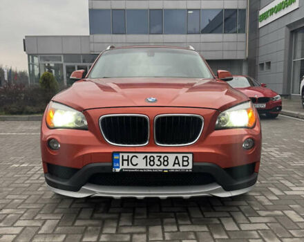 Красный БМВ Х1, объемом двигателя 2 л и пробегом 150 тыс. км за 14000 $, фото 1 на Automoto.ua