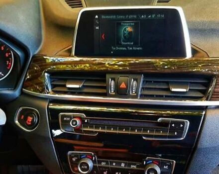 Красный БМВ Х1, объемом двигателя 2 л и пробегом 46 тыс. км за 23000 $, фото 4 на Automoto.ua