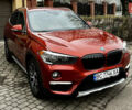 Красный БМВ Х1, объемом двигателя 2 л и пробегом 84 тыс. км за 17800 $, фото 1 на Automoto.ua