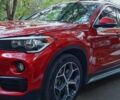 Красный БМВ Х1, объемом двигателя 2 л и пробегом 46 тыс. км за 23000 $, фото 1 на Automoto.ua