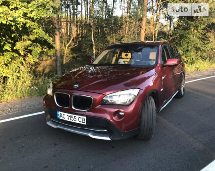 Красный БМВ Х1, объемом двигателя 2 л и пробегом 176 тыс. км за 14100 $, фото 1 на Automoto.ua