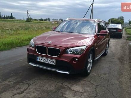 Красный БМВ Х1, объемом двигателя 2 л и пробегом 238 тыс. км за 10800 $, фото 1 на Automoto.ua
