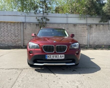 Красный БМВ Х1, объемом двигателя 2 л и пробегом 389 тыс. км за 9400 $, фото 1 на Automoto.ua