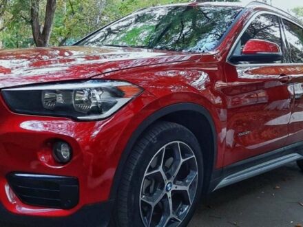 Красный БМВ Х1, объемом двигателя 2 л и пробегом 46 тыс. км за 23000 $, фото 1 на Automoto.ua