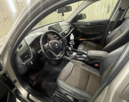 Серый БМВ Х1, объемом двигателя 2 л и пробегом 170 тыс. км за 14000 $, фото 3 на Automoto.ua
