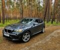 Сірий БМВ Х1, об'ємом двигуна 2 л та пробігом 201 тис. км за 9900 $, фото 1 на Automoto.ua
