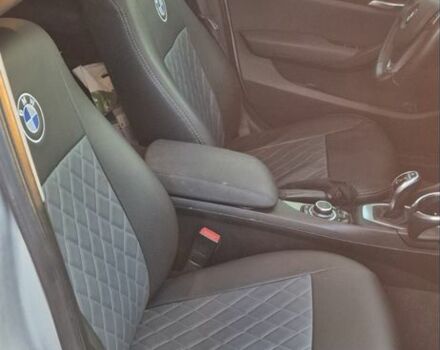 Серый БМВ Х1, объемом двигателя 2 л и пробегом 251 тыс. км за 10300 $, фото 5 на Automoto.ua