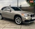 Серый БМВ Х1, объемом двигателя 2 л и пробегом 126 тыс. км за 11990 $, фото 1 на Automoto.ua
