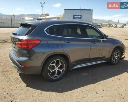Серый БМВ Х1, объемом двигателя 2 л и пробегом 100 тыс. км за 3000 $, фото 2 на Automoto.ua
