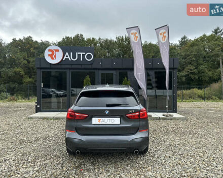 Серый БМВ Х1, объемом двигателя 2 л и пробегом 100 тыс. км за 17000 $, фото 3 на Automoto.ua