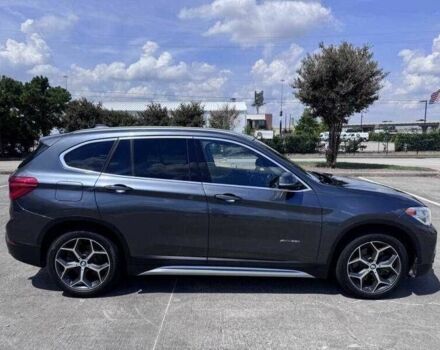 Серый БМВ Х1, объемом двигателя 2 л и пробегом 42 тыс. км за 4000 $, фото 5 на Automoto.ua