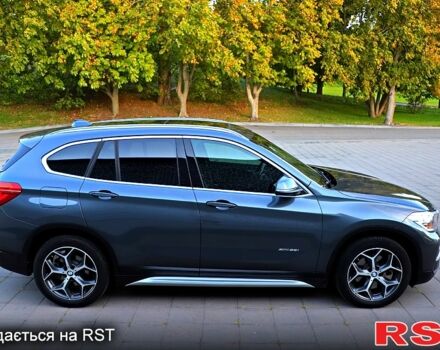 Серый БМВ Х1, объемом двигателя 2 л и пробегом 117 тыс. км за 20999 $, фото 3 на Automoto.ua